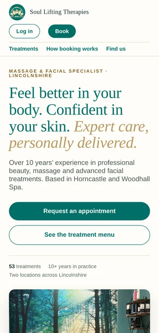 The Soul Lifting Therapies website on a phone